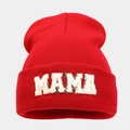 Detail of red knitted beanie featuring golden sequin MAMA letter patches and soft ribbed texture - Red