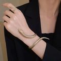 Exotic golden snake-shaped bracelet and ring set with intricate scale texture details - Gold Snake Bracelet Ring Set