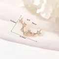 Macro shot of 14k gold plated Pisces zodiac charm with white zircon stones and dimensions - Pisces