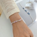 Elegant silver bracelet with alternating rectangular pink stones and clear diamonds - Double Row Pink