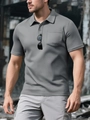 Detail view of grey short sleeve polo shirt with breathable pique fabric and chest pocket - Light Gray