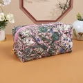 Quilted floral makeup bag in pink and green floral print with golden zipper - Garden Pink