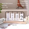 Modern flip calendar with black metal frame and natural wood base for desk decoration - Flip Calendar - Black