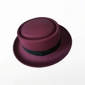 Vintage burgundy wool felt pork pie hat with black ribbon trim on white background - 57cm / Burgundy