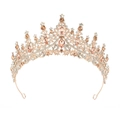 Elegante corona in oro rosa con cristalli rosa e strass su sfondo bianco - Oro rosa con pietre champagne