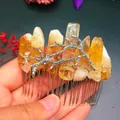 Macro detail of handmade silver hair comb featuring raw yellow crystals and branch motifs - Citrine + Branch