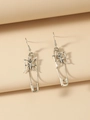 Silver safety pin earrings with a hollow butterfly charm in a punk minimalist style - Antique Silver Butterfly Paper Clip Earrings (3473)