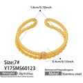 Detailed view of gold beaded stainless steel ring with waterproof and hypoallergenic tags - Size 7