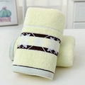 Thick light yellow cotton towel with dark brown floral jacquard border decor - Cotton Flower Bloom Off-White (Towel)