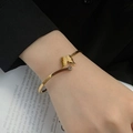 Polished 18k gold butterfly open cuff bracelet with matte finish and cubic zirconia - Gold