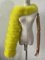 Detail of neon green faux fox fur shawl with segmented stitching on a mannequin - Yellow