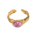 Detailed close-up of 18K gold wave band ring with oval pink natural stone inlay - Wave Woven Pink Oval Stone Texture Style (A1901-02A)