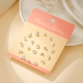 7-day variety set of silver titanium steel stud earrings with star and moon charms - Silver Palm Anchor (E1916-1)