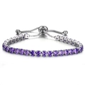 Macro detail of purple round-cut crystal tennis bracelet with adjustable slider clasp - Silver-Purple