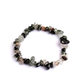 Natural green gravel stone bracelet with irregular crystal chips on a white background - Green Rutilated Quartz