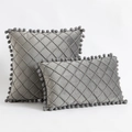 Set of two grey velvet throw pillows with diamond quilting and pom-pom trim accents - Gray