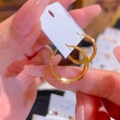 Elegant 18k gold plated geometric hoop earrings with twisted texture and smooth finish - Gold Hoop (18k Gold Plated)