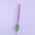 Handmade crochet lavender flower in light purple with green stem on a matching background - Light Purple
