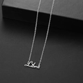 Silver zodiac necklace featuring a Libra pendant on a minimalist stainless steel chain - Libra Steel
