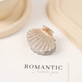 Elegant shell hair claw in silver glitter finish with golden lines for women's styling - Silver with Logo