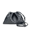 Elegant black woven leather crossbody bag with drawstring closure and slim shoulder strap - Black