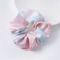 Pastel pink and blue tie-dye organza scrunchie on white plate for elegant hair styling - Pink Dreamy Scrunchie