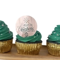 Close-up of rose gold acrylic Merry Christmas cupcake topper on green frosting - Rose Gold Bell Style