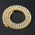 Detail of triple-row gold tennis necklace with sparkling round zircon crystals and clasp - Gold White Zirconia 5mm