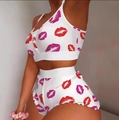 Detail view of white pajama set with lip prints and ruffled hem on shorts - S / Top And Bottom / White Lip Print Style (2008)