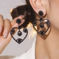 Elegant hollow heart earrings featuring sparkling black rhinestones for women - Black Hollow Heart Full Rhinestone Style (DTE1516025GU-BK)