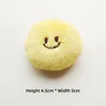 Detail of yellow plush charm with embroidered smile face measuring 4.5cm by 5cm - DIY Style (Back Opening) / Table Tennis
