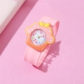 Pink cupcake-shaped kids cartoon watch with soft silicone strap on a matching background - Cake