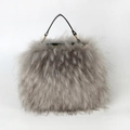 Faux raccoon fur handbag in grey with black handles and golden zipper detail - Gray