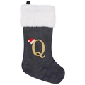 Detailed view of gray velvet Christmas stocking with golden glitter letter Q embroidery - Letter Q