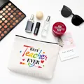 Canvas makeup bag with BEST Teacher EVER print and gold zipper on white background - Style E