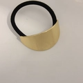 Minimalist elastic hair tie with arched brushed gold metal piece for modern styling - Fine Stripe Oval Gold