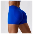 Détail du short de yoga bleu taille haute sans couture avec coutures sculptantes - S / Bottoms / Bleu