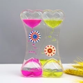 Pink and lime green liquid motion bubbler with heart design for stress relief - SY01 New Windmill Pink Yellow
