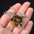 Tiger's eye stone pendulum with golden Cho Ku Rei symbol and silver chain for reiki - Tiger's Eye