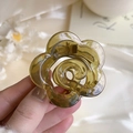 Translucent lime green flower hair claw clip made of durable resin for women - Amber Brown Camellia Claw Clip