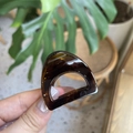 Detail of dark brown tortoiseshell hair claw clip with strong spring and glossy resin finish - Mini Cat Ear / Glossy Light Tortoise