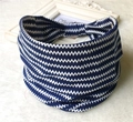 Detail of bohemian blue and white wavy print headband on a soft white carpet texture - EU 29