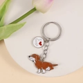 Close-up of a dachshund dog keychain with a red heart I Love Dogs engraved charm - Brown Dachshund (M10205)