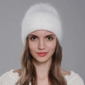 Plush white angora rabbit fur beanie with vertical knit and matching pompom detail - White