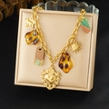 Vintage gold chunky chain necklace with heart, sun and leopard resin charms - Gold Multi-Pendant Bohemian Style (N3900)