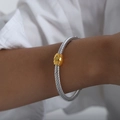 Two-tone cable twist bangle with golden accents and marquise-cut yellow gemstone - Yellow Rhinestone