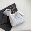 White quilted tote bag with gold chain strap and mini pouch for women's summer fashion - Off White