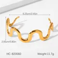 Macro shot of gold-plated wavy bangle with dimensions 6.23cm diameter and 11.7g weight - Minimalist Streamlined Wave Open Style (HC-B20060)