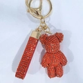 Sparkling red rhinestone cartoon bear keychain with matching studded wrist strap - Orange