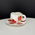 Irregular handmade ceramic coffee cup with red tulip floral pattern and matching saucer - Big Red Flower Cup & Saucer